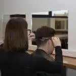 Réalisation d'une coupe par nos élèves en salon de coiffure.